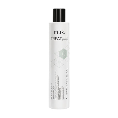 muk. Treat+ shampoo bottle on a white background