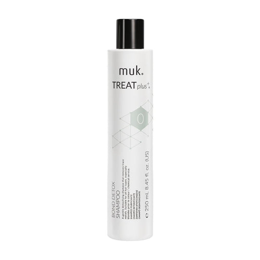 muk. Treat+ shampoo bottle on a white background
